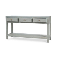 Three-drawer pale blue console table, side angle.