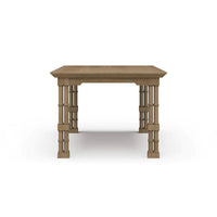 Wooden dining table side view, showcasing detailed legs.