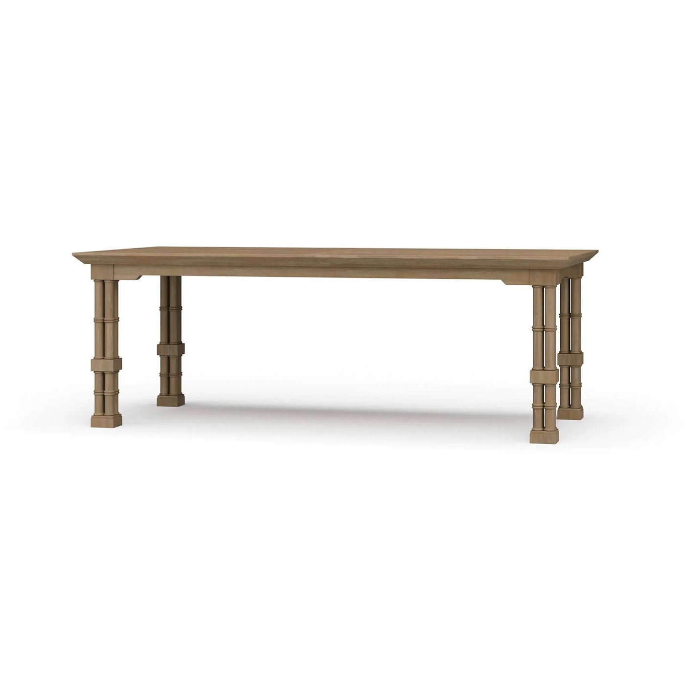 Wooden dining table angled view with ornate legs.
