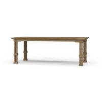 Wooden dining table angled view with ornate legs.