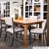 Side view of table and chairs in home setting.