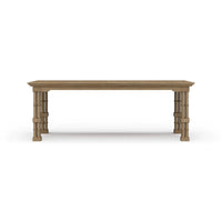 Wooden dining table front view, decorative legs visible.