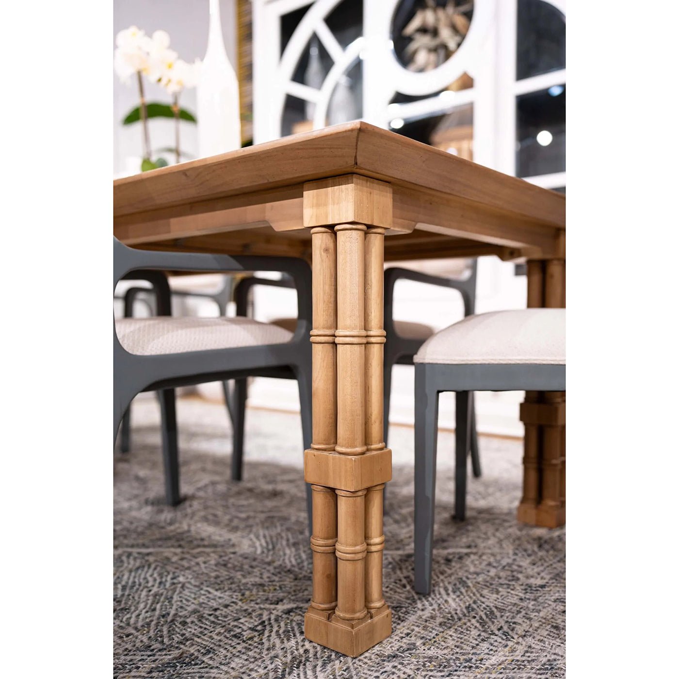 Detailed leg view of Palm Beach Regency dining table.