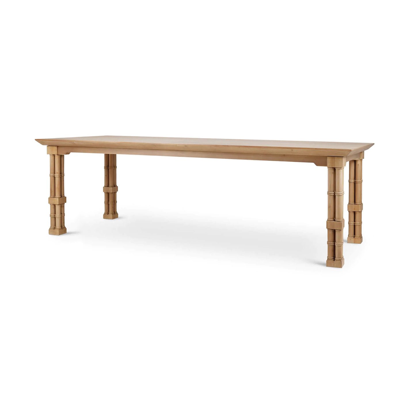Angled view of wooden Palm Beach Regency dining table.