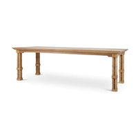 Angled view of wooden Palm Beach Regency dining table.