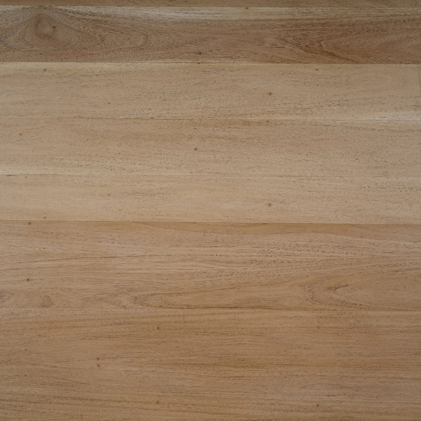 Wood grain texture detail of dining table surface.