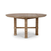 Alternate side view of round wood dining table.