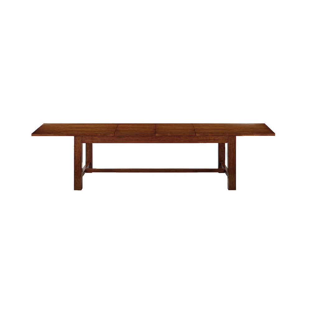 Extended Parsons dining table, mahogany finish, wood texture.