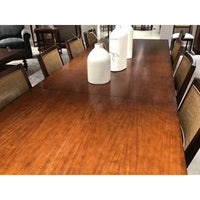 Close-up, table surface, mahogany Parsons dining table, decor display.