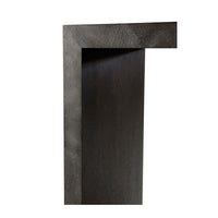 Side angle of Parsons console table edge.
