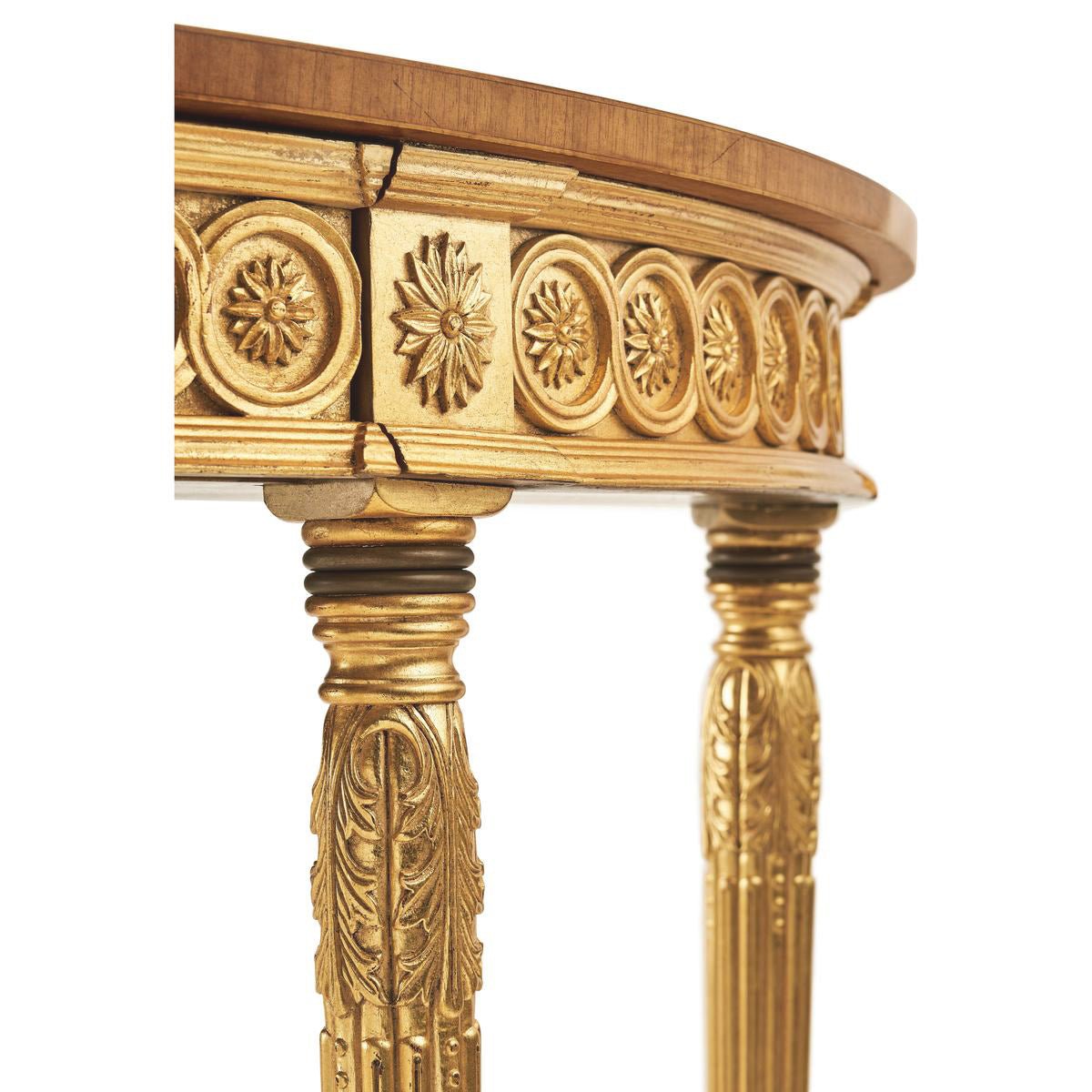 Carved leg details of giltwood console table.