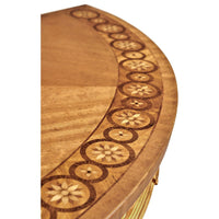Close-up of table's intricate marquetry design.