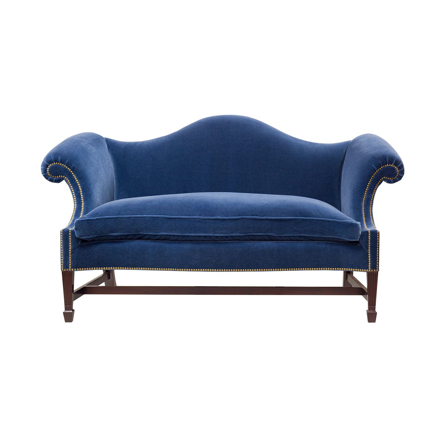 Front view of classic blue camelback sofa.