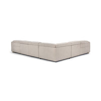Rear-angle view of gray sectional showing its low upholstered back and corner layout