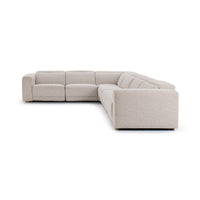 Front-angle view of gray reclining sectional with footrests closed and headrests lowered