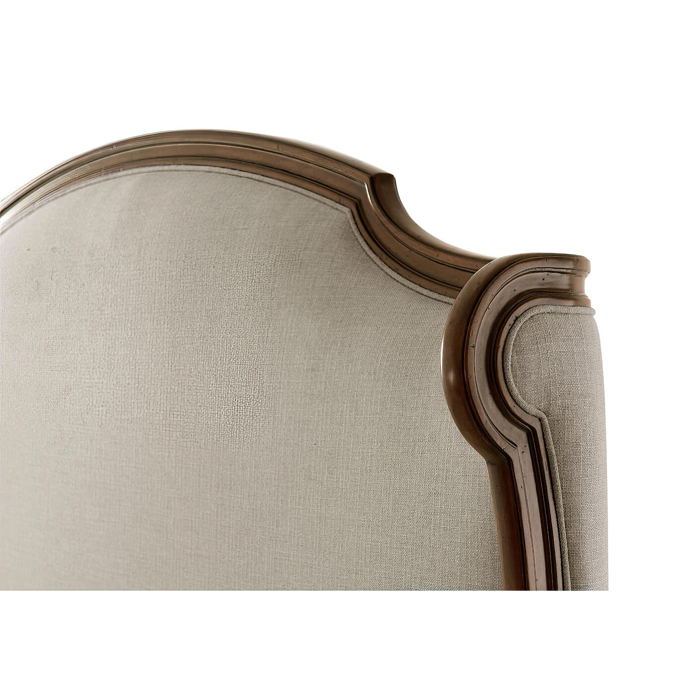 Detailed view of headboard corner, elegant curves.
