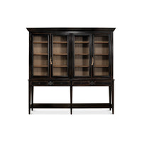 Front view of ebonized display cabinet, glass shelving bookcase.