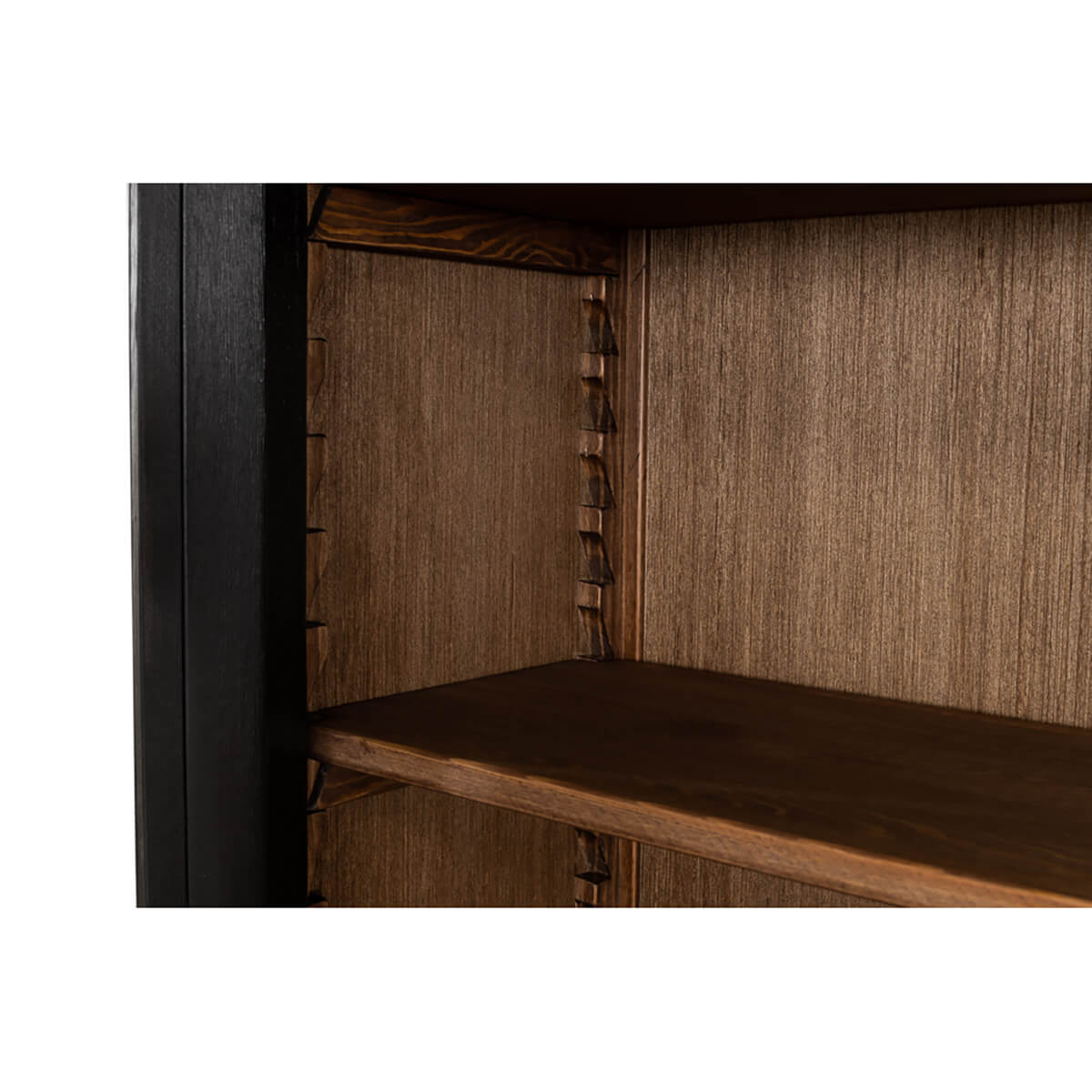 Detailed corner of the ebonized display cabinet shelves.