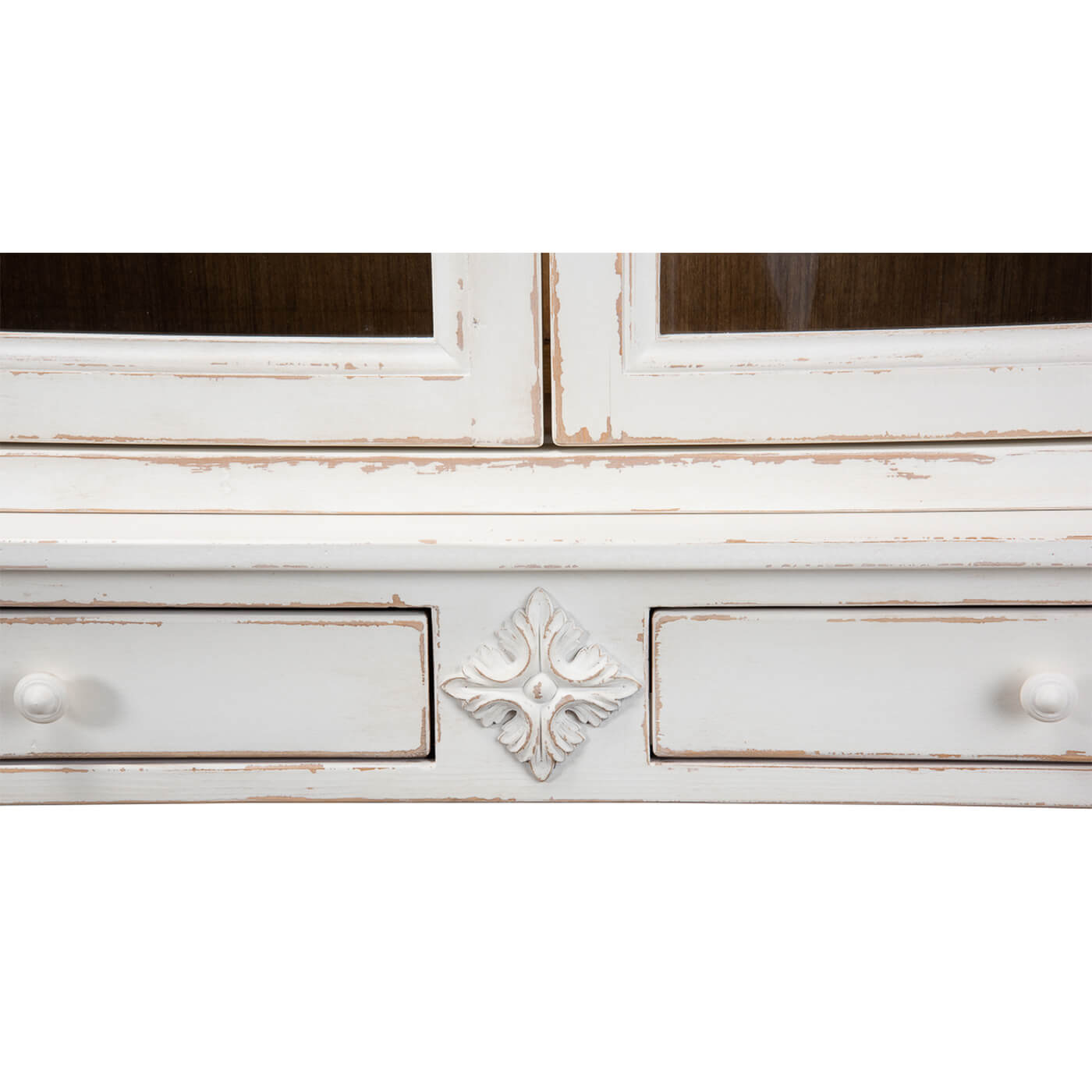 Close-up of decorative detail on cabinet front.