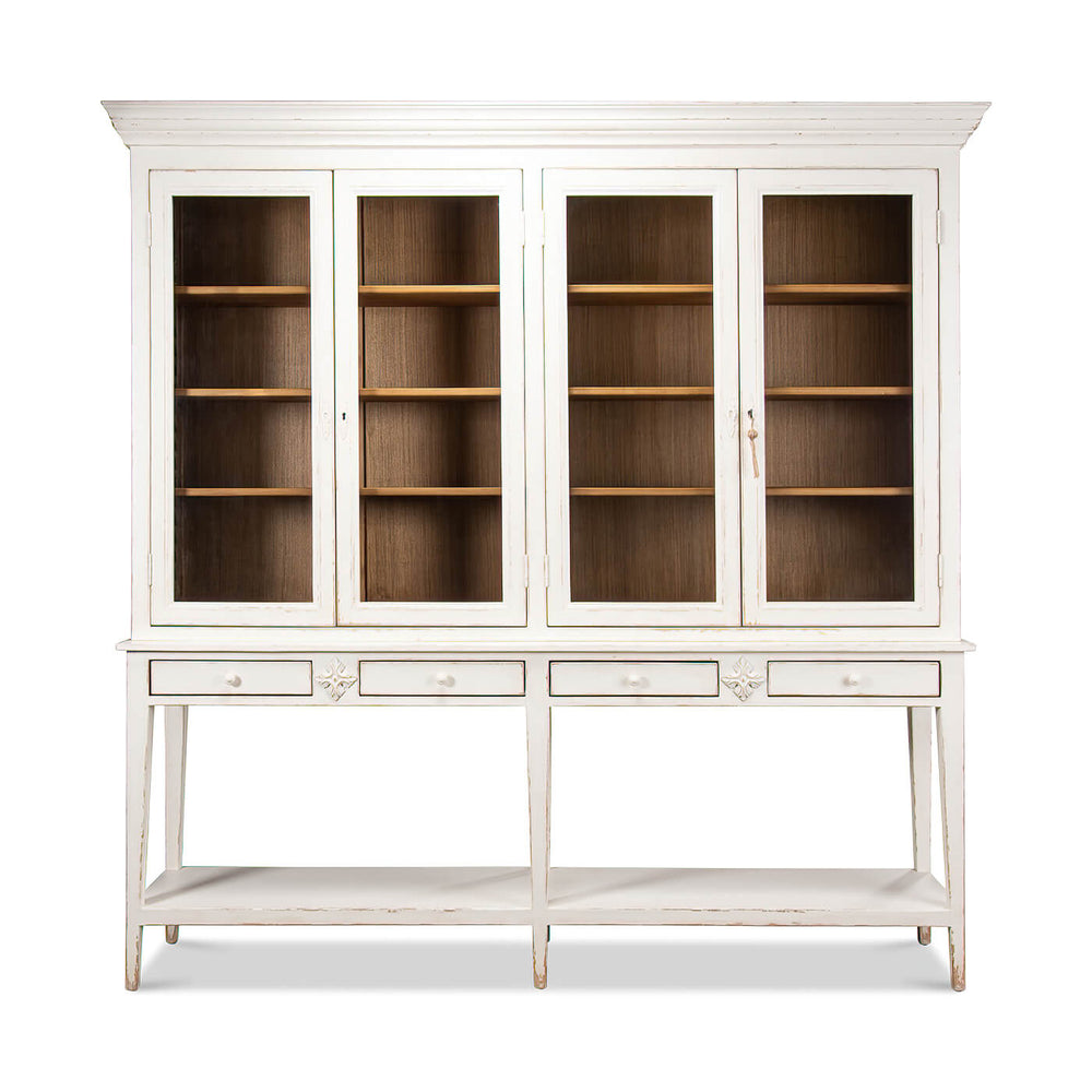 Front view of white display cabinet with glass doors.