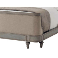 Corner detail of bed footboard with leg design.