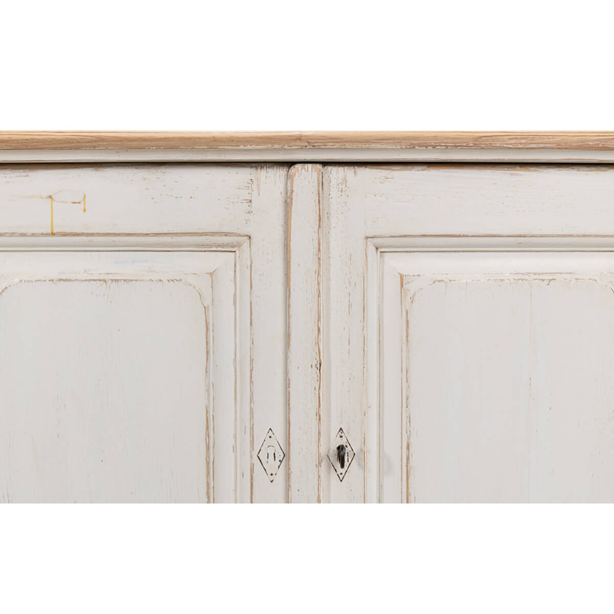 Detail of doors on whitewash painted buffet.