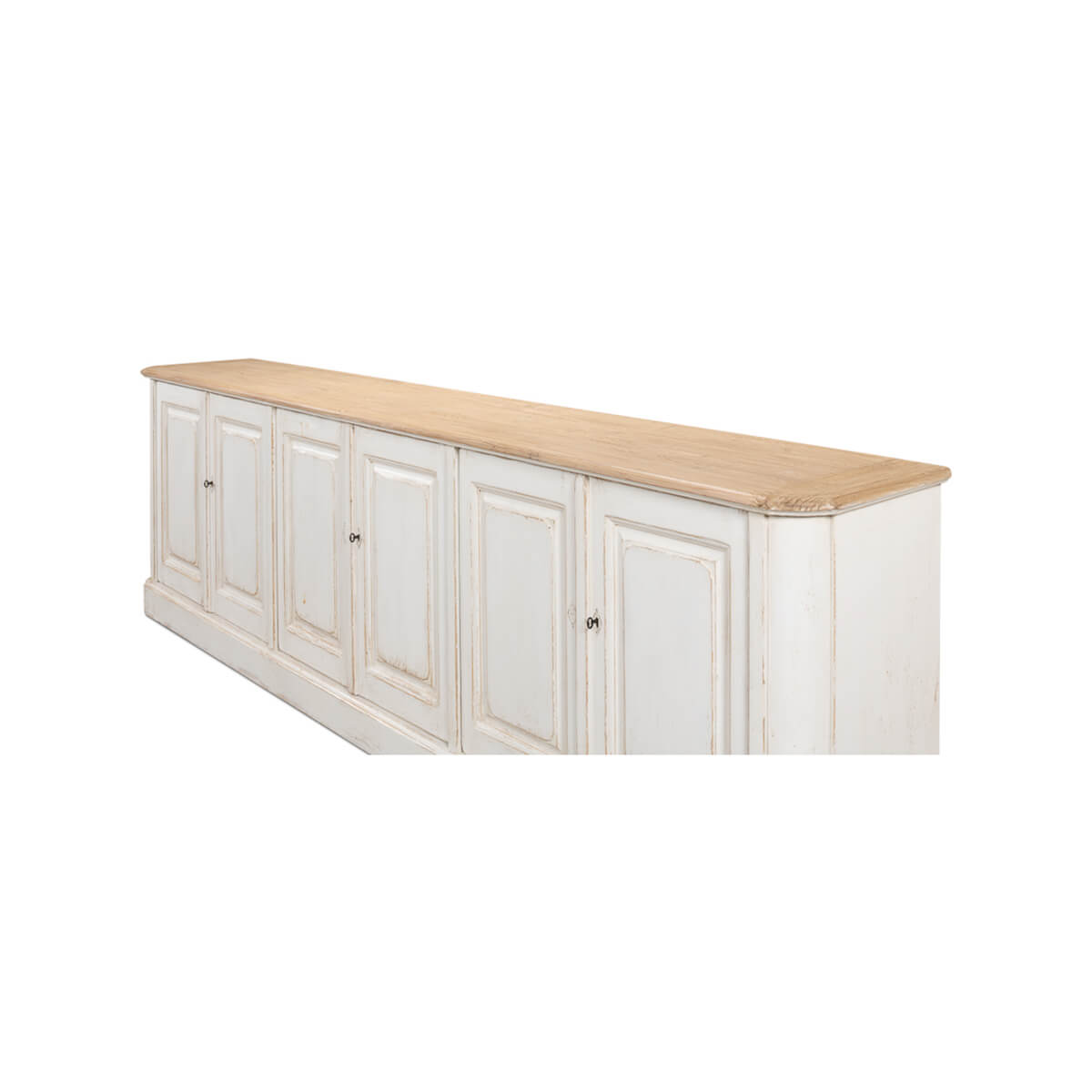 Side angle of whitewash painted buffet highlighting design.