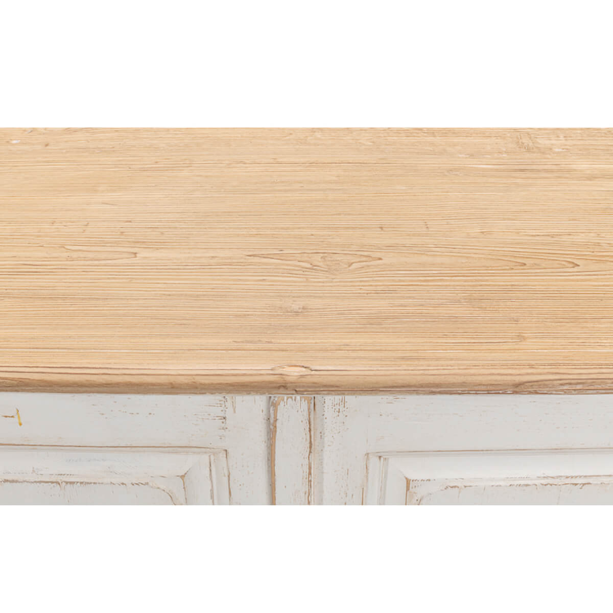 Wooden surface close-up on whitewash painted buffet.