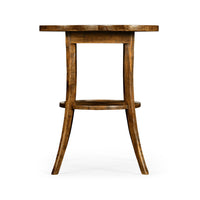 Side view of walnut quatrefoil end table.