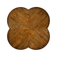 Top view of quatrefoil walnut end table.