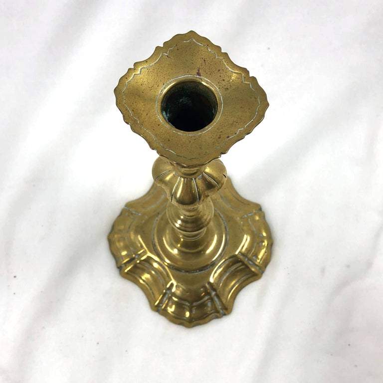 Top view of Queen Anne brass candlestick design.
