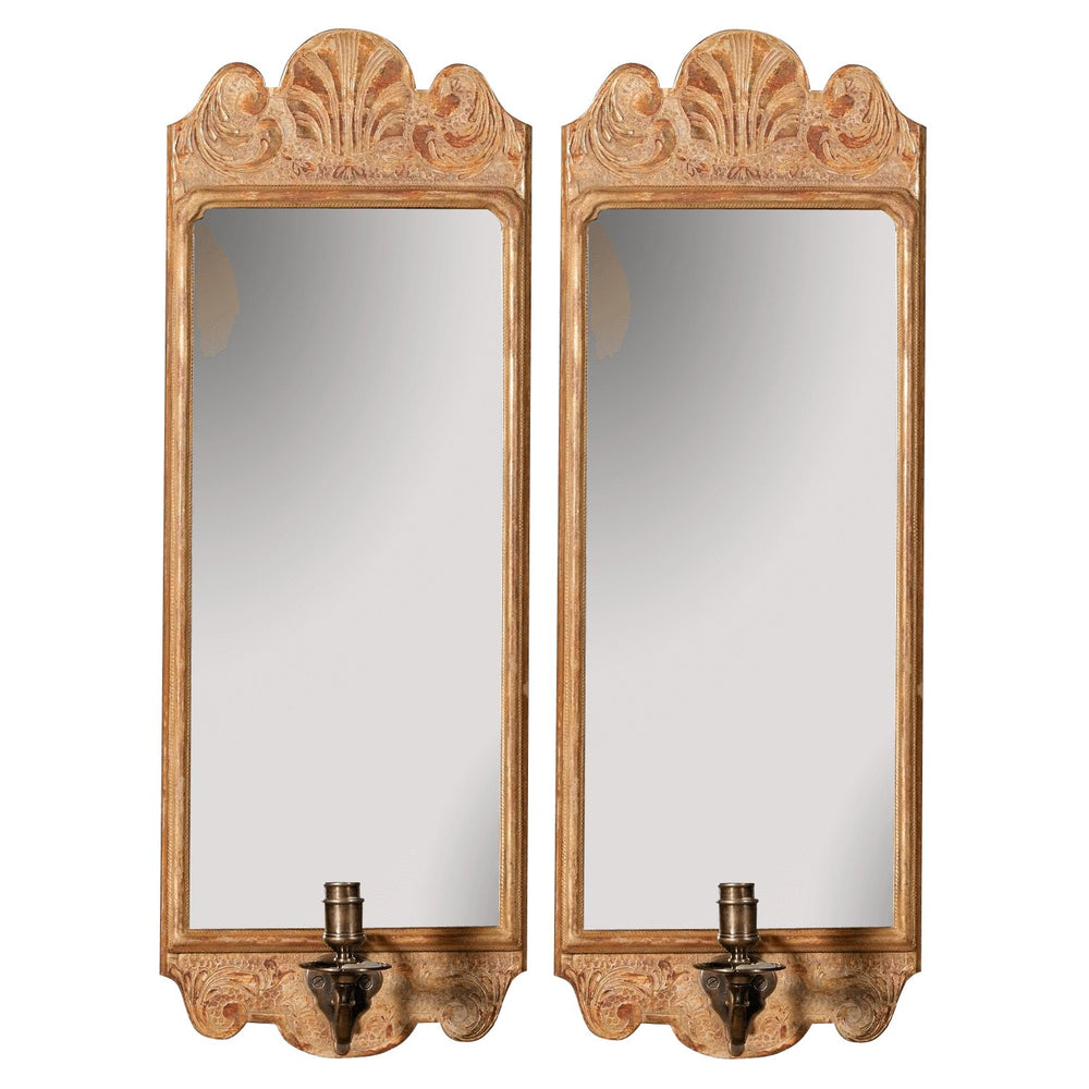Queen Anne giltwood wall sconces with ornate mirrors.