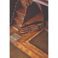 Close-up drawer details inside Queen Anne secretary bookcase.