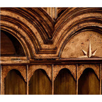 Detailed arch design on Queen Anne secretary bookcase.