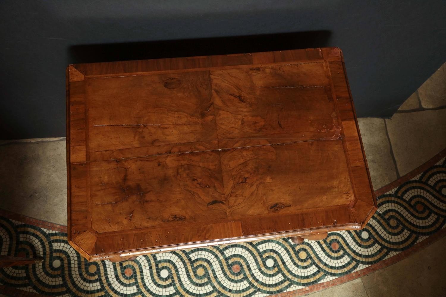 Top view of Queen Anne walnut lowboy, wood grain pattern.