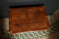 Top view of Queen Anne walnut lowboy, wood grain pattern.