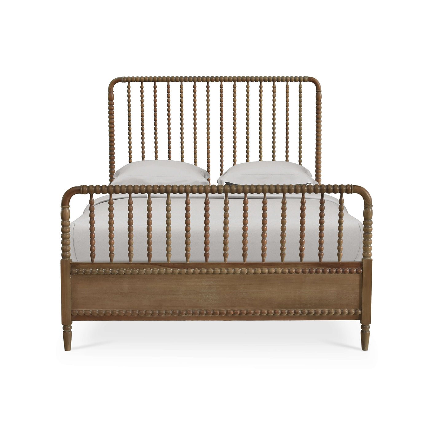 Wooden spindle bed frame, front view with pillows.