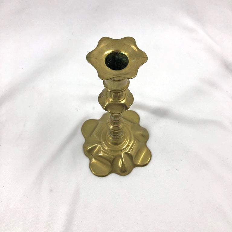 Top view of Queen Anne candlestick showing scalloped design.