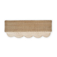 Top view of rattan console table with scalloped edge.