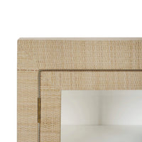 Close-up of rattan cabinet corner detail.