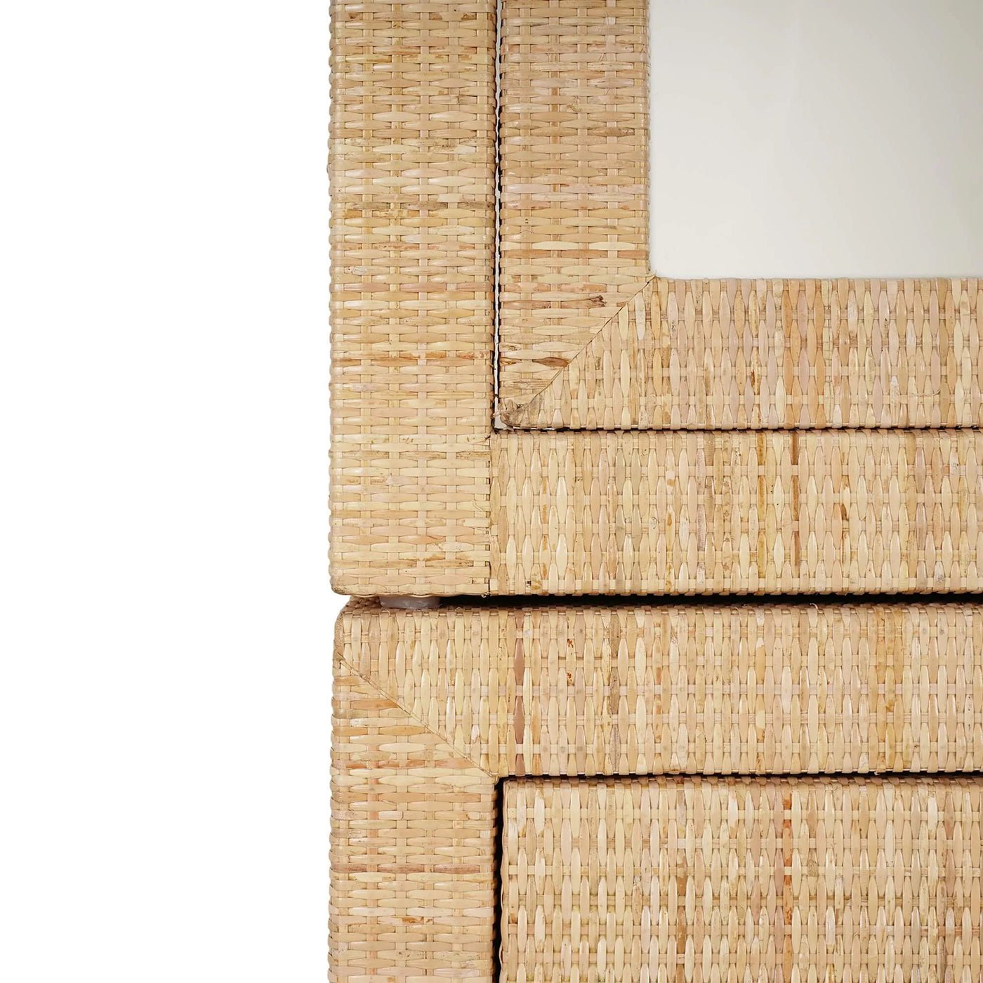 Detail of rattan cabinet edge and drawer connection.