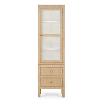 Closed rattan cabinet front view with visible drawers.