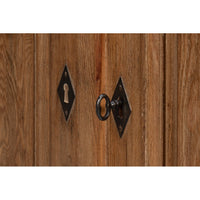 Key and lock detail of reclaimed pine side cabinet doors.