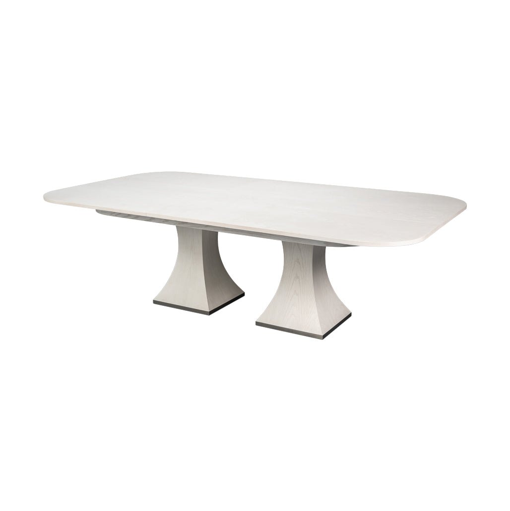 Rectangular white dining table with a modern design.