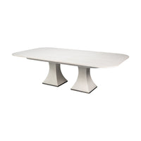 Rectangular white dining table with a modern design.