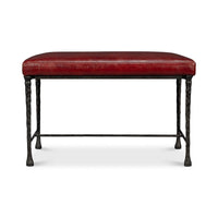 Straight front view of small bench with red leather seat.