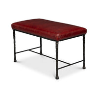 Side angle view of rustic bench, red leather seat.