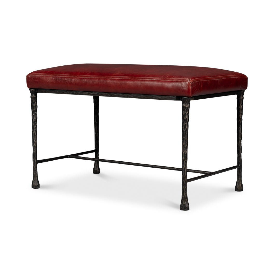 Side view of rustic bench showing iron legs.
