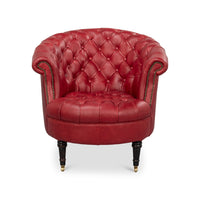 Red leather barrel back chair front view.