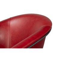 Red leather tub chair top edge view.